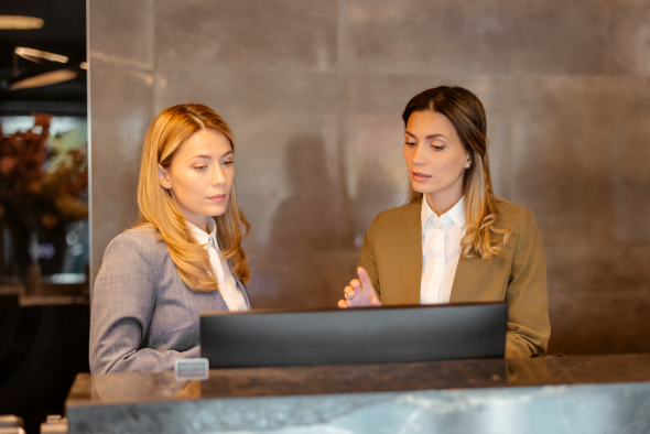 front desk staff learning more about expedia cancellation policy